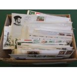 A large quantity of first day covers and stamps on cover