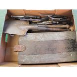 A WWI French Hoskis ammo tin with three WWI German entrenching tools and four pairs of wire cutters