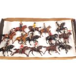 Fourteen mostly Britains mounted cavalry