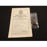 A German (PATTERN) DVL Sports badge and award document with photo