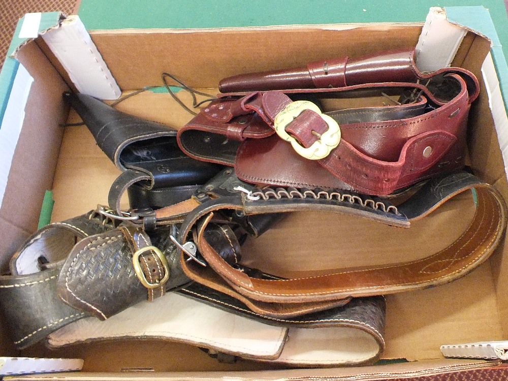 A box of US Western style leather holsters