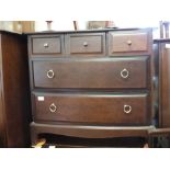 A Stag chest of three short and two long drawers and another with four long and three short drawers