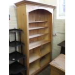 A modern pine open bookcase with compartments below, height 75", width 43",