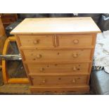 A modern pine chest of two short and three long drawers, height 37", width 34",