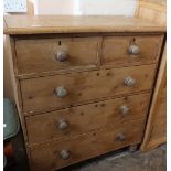 A Victorian pine chest of two short and three long drawers on turned legs, height 42", width 35",