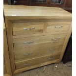 A modern light oak chest of two short and three long drawers, height 37", width 35",