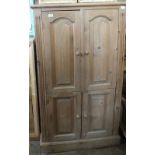 A modern pine four door TV/Hifi cabinet, height 60", width 32",