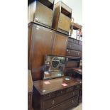 A Stag dressing table and wardrobe and a pair of veneered oak bedside cabinets