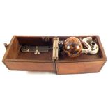 A cameraphone (small portable gramophone) in leather case,