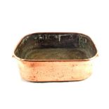 A heavy 19th Century oblong twin handled seamed Copper roasting pan,