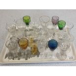 A tray of various drinking glasses