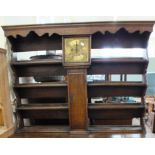 An unusual oak dresser top with four shelves,