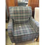 A modern tartan upholstered armchair