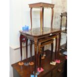 A nest of three Italian inlaid tables and a musical work table