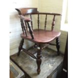 A 19th Century elm smokers bow chair