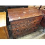 A 19th Century mahogany three drawer chest on bun feet