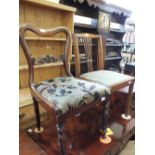 A Victorian mahogany spoonback chair and one other