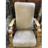 An Art Deco reclining sunburst oak frame armchair with cream upholstery