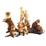 Various composition meerkats and otters