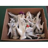 A large quantity of heart shaped trinket boxes and ring holders in the form of hands