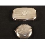 A round Silver vesta case with leaf engravings,