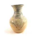 A mottled grey, black and white pottery vase,
