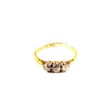 An 18ct Gold Platinum set three stone Diamond ring (shank cut)