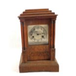 An Oak wall clock plus a striking mantel clock