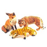 A composition Country Artists vixen and tiger plus one plaster tiger