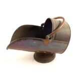 A 19th Century Copper coal helmet