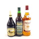 A bottle of Bells Whisky plus two other beverages