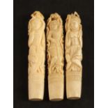 Three vintage Indian Ivory implement handles carved with Hindu Deities