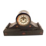 A Victorian black and rose marble striking mantel clock