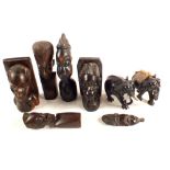 Various African hardwood busts and elephants