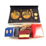 A box of costume jewellery and cased scales