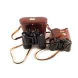 Two pairs of binoculars,