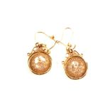 A pair of 1854 one dollar miniature Gold coin earrings in 9ct Gold mounts