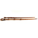 Two Congo Tribal carved wooden walking sticks