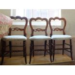 Three Victorian mahogany shaped top dining chairs