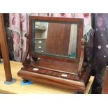 A Victorian mahogany swing toilet mirror