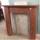 A modern fire surround with marble panelling