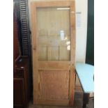 Six various stripped pine panel and glazed doors