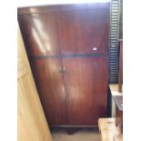 A mahogany double wardrobe