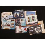 A packet of approximately 100 U/M miniature sheets,