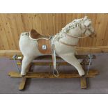 A rocking Mamas & Papas horse