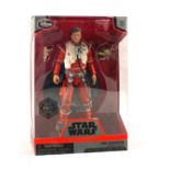 A boxed Star Wars Poe Dameron,