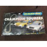 A boxed Scalextric Champions Tourers set