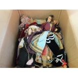 A box of various costume dolls