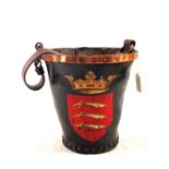 A rare William IV 1830/37 leather fire bucket with Essex crest and copper riveted band to rim