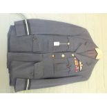 An RAF WWII Air Commodores jacket and trousers complete with Kings Crown pilots wings,